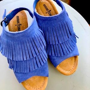 Minnetonka fringe wedge sandals.